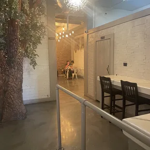 More room in the back, quieter space, also there is WiFi and printer.