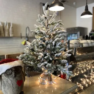 a christmas tree with a santa hat