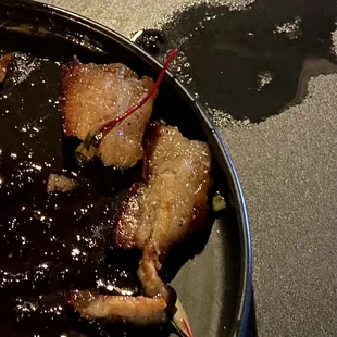 Pork Belly Appetizer. $10 for 3 slices of pure fat. Not worth it.