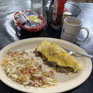 Look how thick that western omelette is! Hash browns instead of any bread w/coffee! Yum yum get you some!