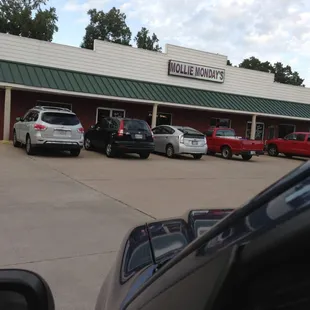 cars parked in front of a building