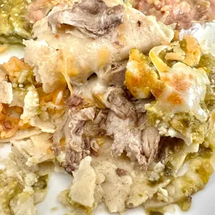 2/2023. Enchilada and Chile Relleno. Enchilada is filled with carnitas.