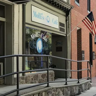the entrance to molli's cafe