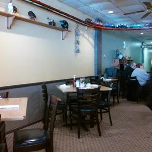 They have a country decor and a train that they run around the track its suspended.