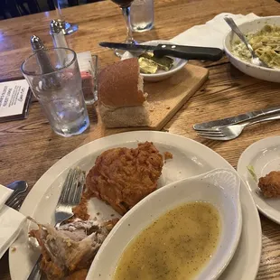 Empty dish of local squash and fried chicken