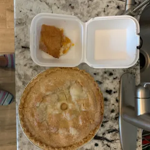 A almost slice of peach cobbler and a whole Apple pie. $2217
