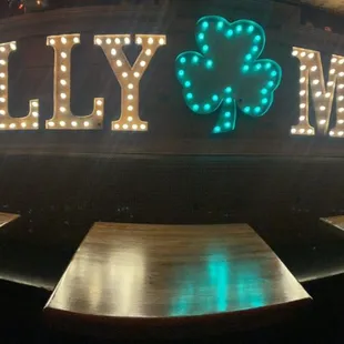 a bar with a lighted sign