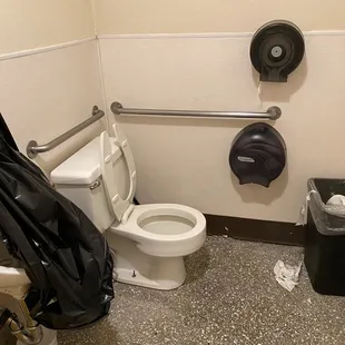 Urinal out of order. Restroom is testament to this being an old place.