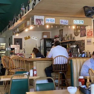 The counter has five chairs.