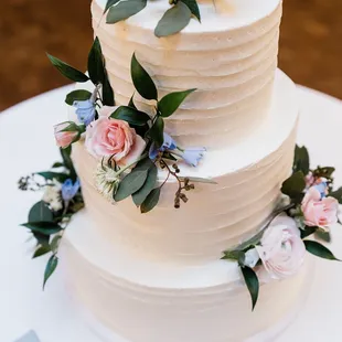 a three - tiered wedding cake