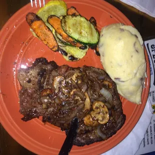 Awesome 19 ounce steak cooked to perfection.whipped potatoes and grilled veggies , better then sex this is top shelf steak diner