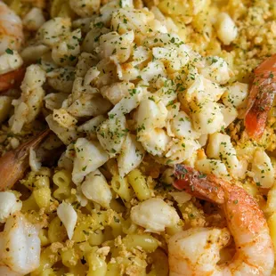 a bowl of shrimp and pasta