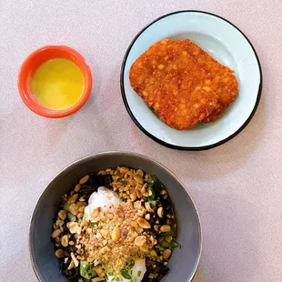 Collard green bowl with grits and poached eggs Hashbrowns on the side