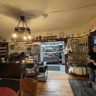 a woman walking through the store