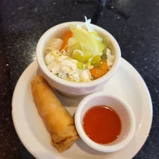 Complimentary egg roll and soup