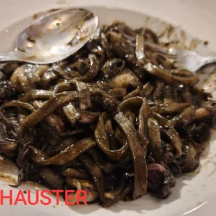 REAL HOT SQUID INK PASTA WITH SQUID. OTHER PLACES USE FOOD COLOR. THIS DISH WAS REAL SQUID INK SOOOO GOOD