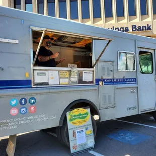 a food truck parked in a parking lot