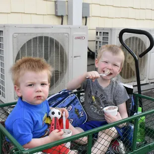 two children in a wagon