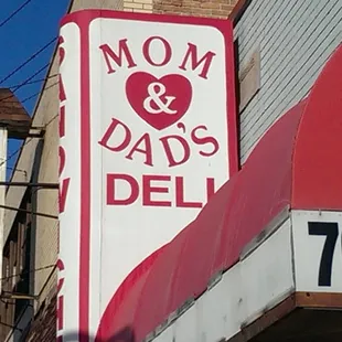 a sign for a deli