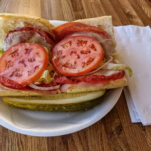 Hot Italian with lettuce tomatoes and onions