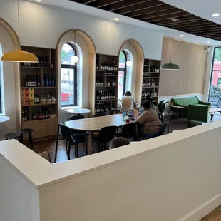  a woman sitting at a table