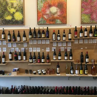 shelves full of wine bottles