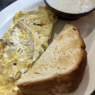 Voula's omelet (special with fries, bacon, and feta) &amp; grits (not good grits, in my opinion)