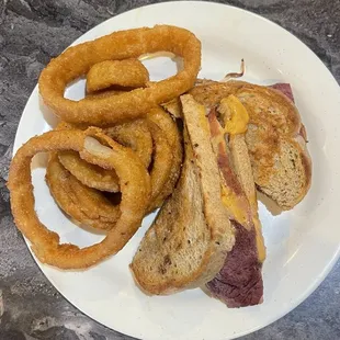 Corned Beef Reuben Sandwich with Rye Bread and Onion Rings!!! This is so good!