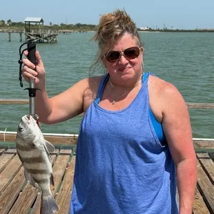 Wives catching bigger fish than husbands.