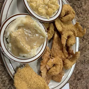 Surf n clucks- fried chicken, fried catfish, jumbo shrimp, mashed potatoes and man n cheese