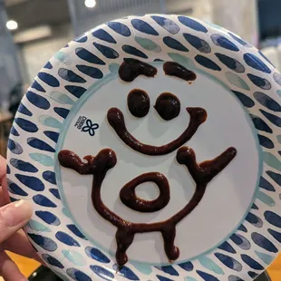 I drew this with my bibimbap sauce on the plates they gave us