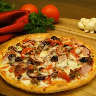 a pizza on a cutting board