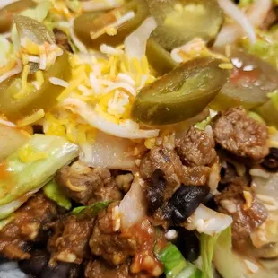 Brazilian Bowl - Steak w/ choice of toppings.  (Beef Empanada separate)