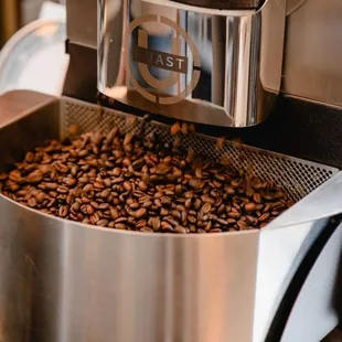 a person making coffee beans