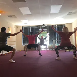 Barre warm up with hand weights