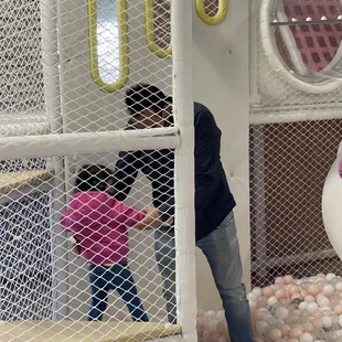 Slides, ball pit,  and tunnels.