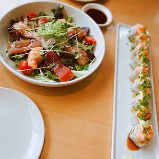 Sashimi salad lunch, sorry -- forgot what the roll to the right was. Both very yummy dishes!