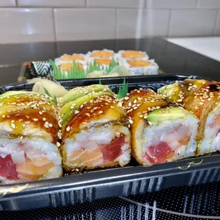 Capital Roll (front) and Spicy Salmon Roll (back) 10/10!!! Must try