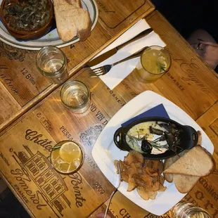 a plate of food on a wooden table