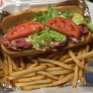 Oven baked Italian hoagie.  Look at that thick, juicy tomato !!