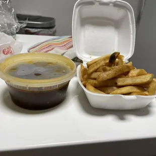 Stewed chicken and fries (missing coleslaw, plantains, and more chicken for what was ordered...kinda important)