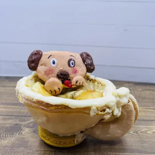 a dog in a bowl of bananas