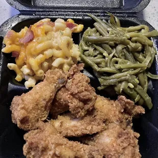 Auntie DeeDee's Fried Chicken, garlic butter green beans and jalapeño and bacon Mac and cheese.