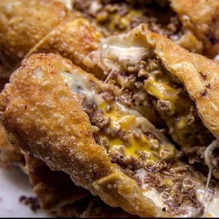 a close up of a cheeseburger sandwich