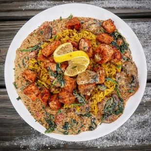 a plate of food on a wooden table