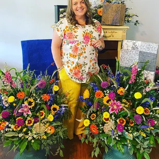 Momma and huge fresh memorial vases! A wildflower theme.
