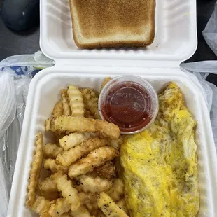 Western or Southwestern omelette with fries and toast.