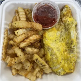Western or Southwestern omelette with fries and toast.