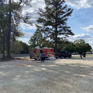 a food truck parked in a parking lot