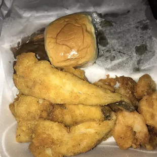 Fish and shrimp combo with bread. Not good at all for $15 food tasted refried